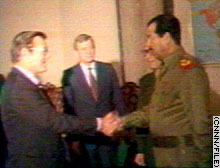 picture of Donald Runsfeld  greeting Saddam Hussein in 1983